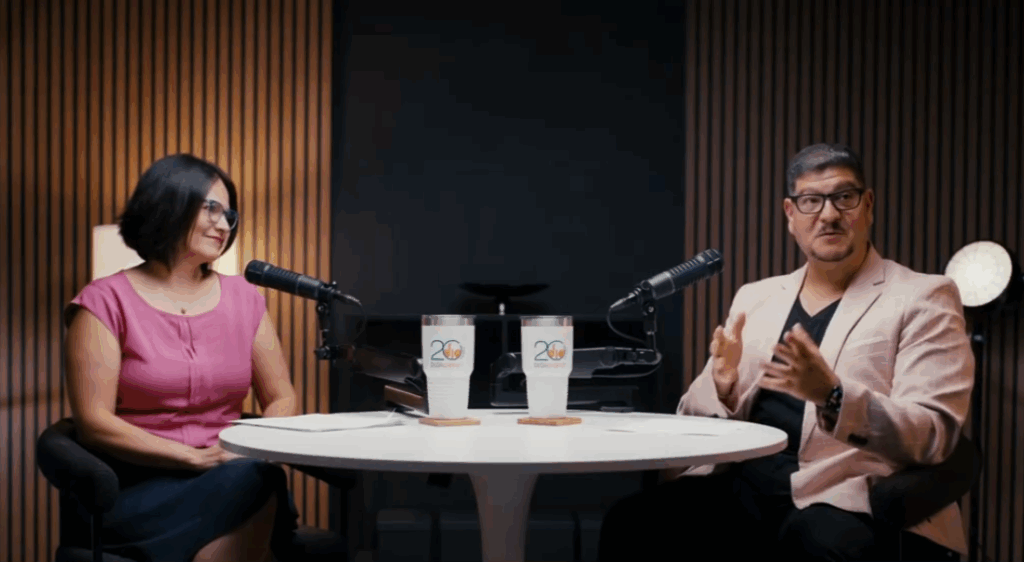 Moderating Life Podcast episode 1 hosts recording in studio with microphones